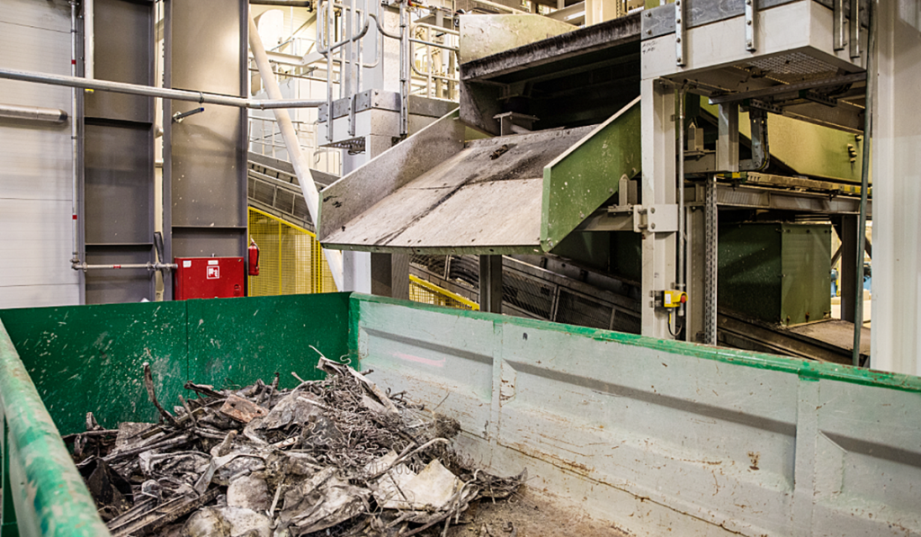 Industrial waste materials being processed at a waste management facility